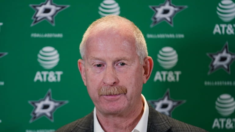 Dallas Stars general manager Jim Nill speaks to reporters during...