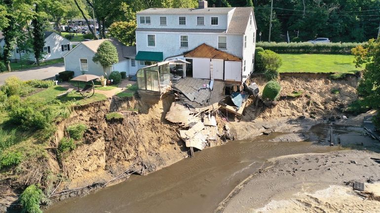 The rear of this home on Stony Brook’s Main Street,...