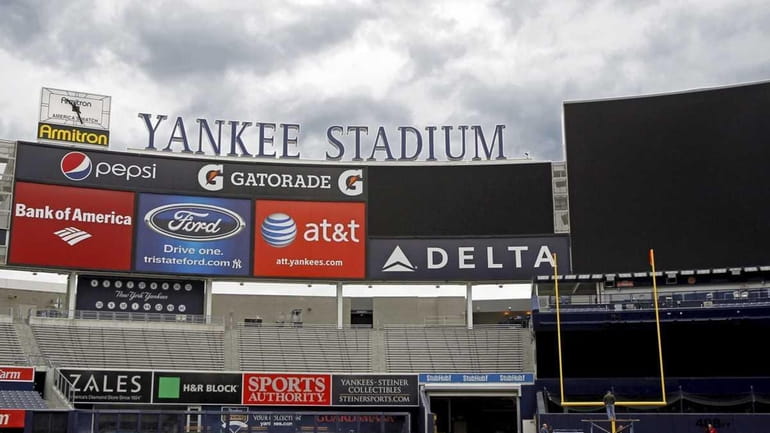 A football goal post being installed at Yankee Stadium. (Oct....