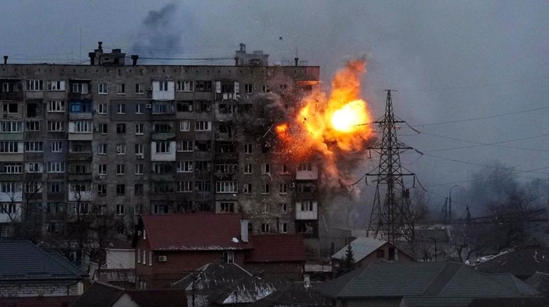 Firing from a Russian army tank results in an explosion in an apartment...