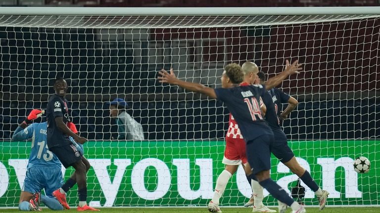 PSG players celebrate after a goal during the Champions League...