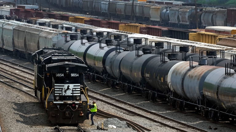 Norfolk Southern locomotives are moved in Norfolk Southern's Conway Terminal,...