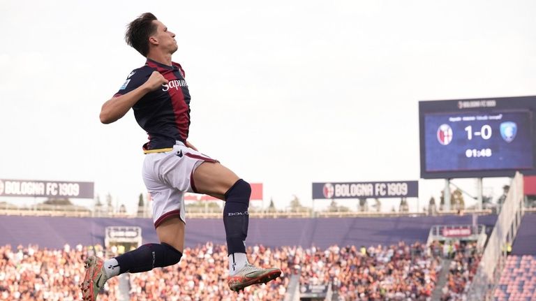 Bologna's Giovanni Fabbian celebrates scoring during the Serie A soccer...