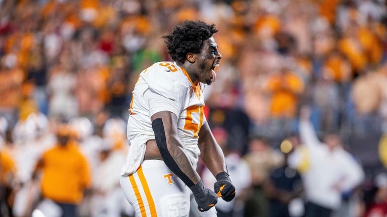 Tennessee Volunteers defensive lineman Omarr Norman-Lott (55) celebrates a stop...