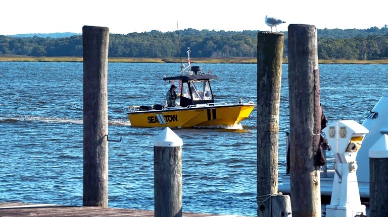 A Sea Tow boat is on the scene at Harbor...