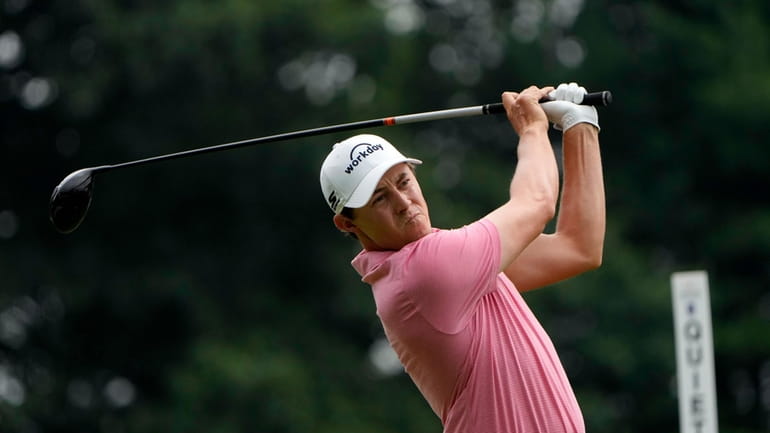 Matt Fitzpatrick, of England, tees off on the first hole...