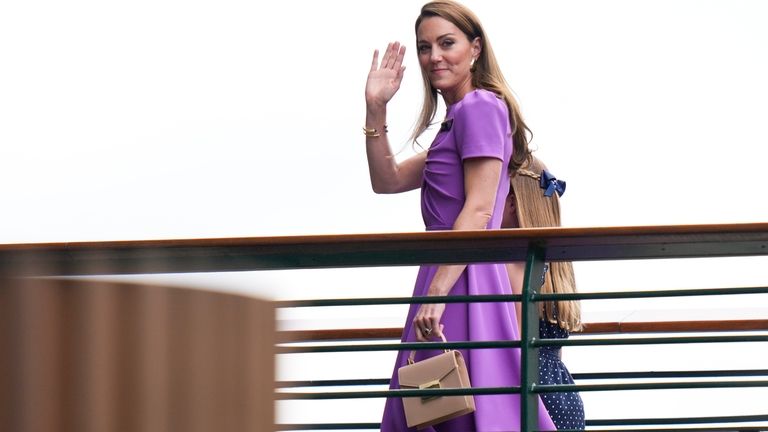 Kate, Princess of Wales waves as she makes her way...