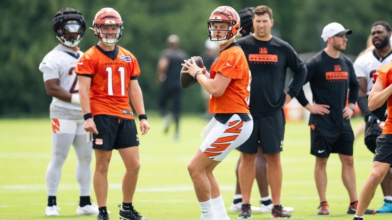 Cincinnati Bengals quarterback Joe Burrow (9) drops back to pass...