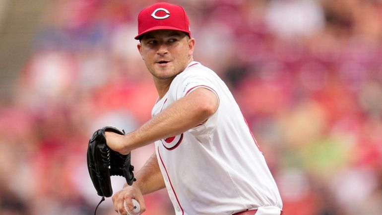 Cincinnati Reds pitcher Carson Spiers looks to throw during the...