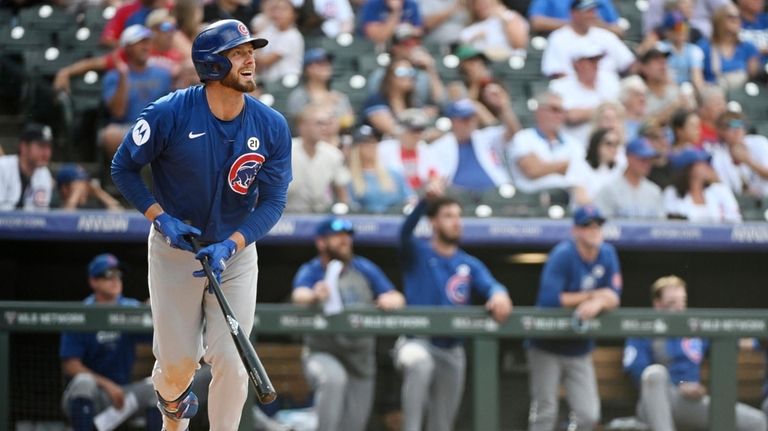 Chicago Cubs' Michael Busch reacts after hitting a one-run home...