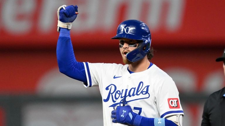 Kansas City Royals' Bobby Witt Jr. celebrates a two-run double...