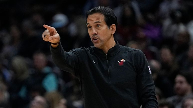 Miami Heat coach Erik Spoelstra gestures during the first half...