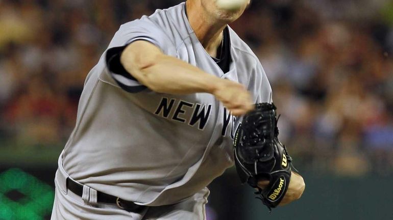 New York Yankees relief pitcher Cody Eppley throws during the...