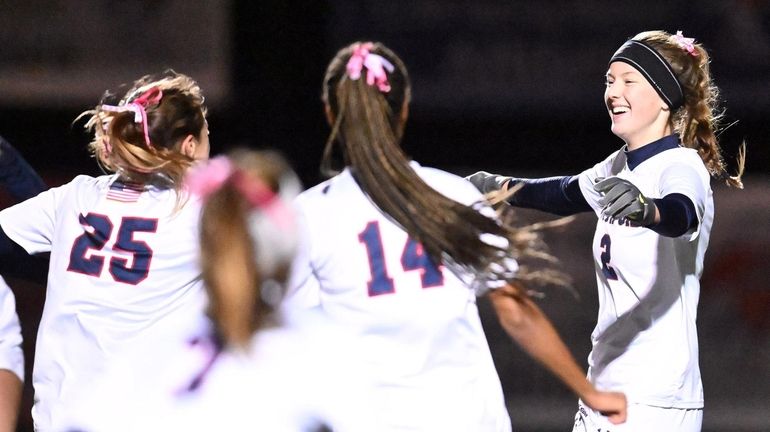 Nora Basile of South Side celebrates her OT goal in...