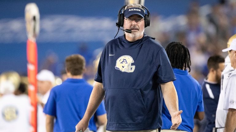 Akron head coach Joe Moorhead reacts on the sideline during...