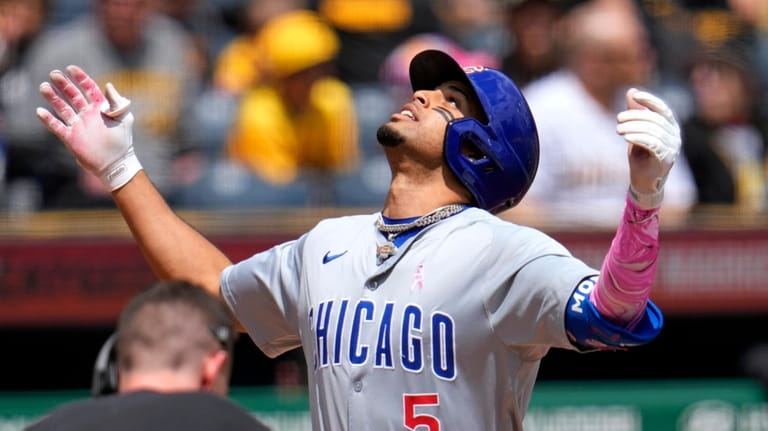 Chicago Cubs' Christopher Morel (5) celebrates as he crosses home...