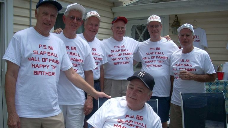 George A. Giuliani, second from left, and some of his...