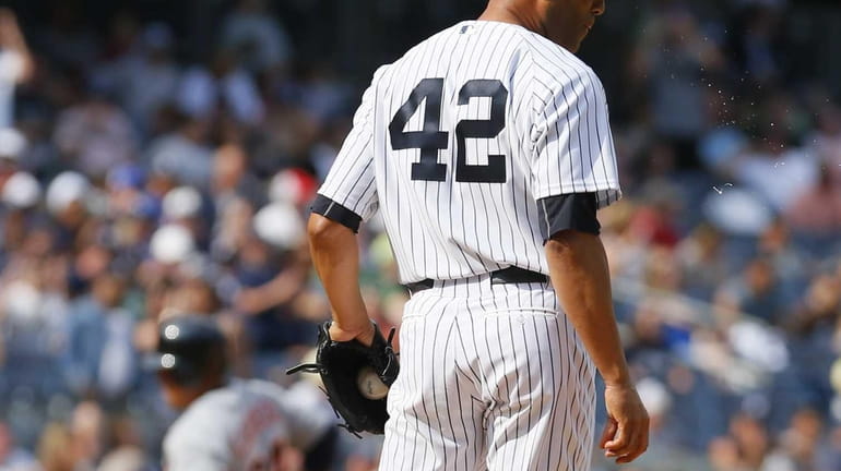 Mariano Rivera reacts after giving up a solo home run...