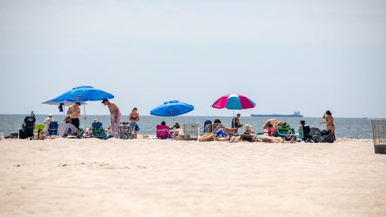 Beachgoers at Jones Beach in Wantagh, New York on Friday.