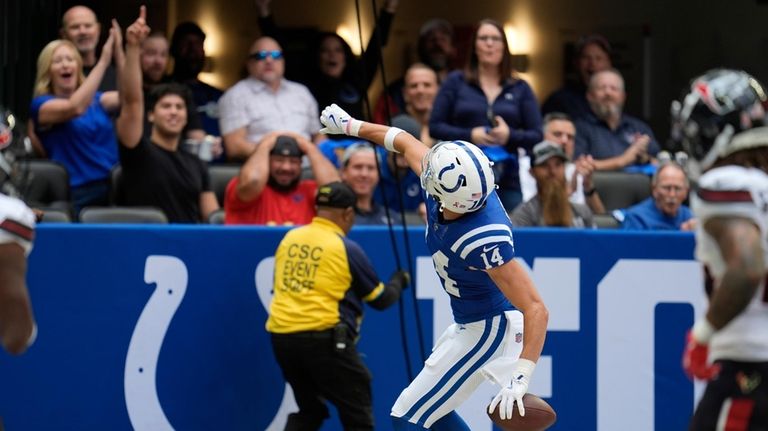 Indianapolis Colts wide receiver Alec Pierce (14) celebrates a touchdown...