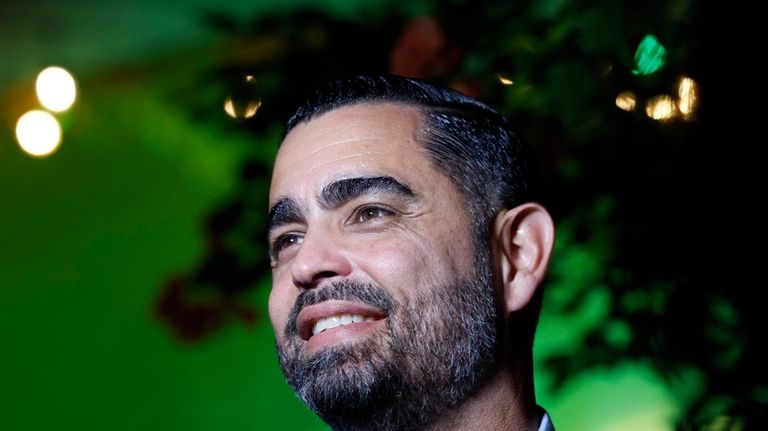 Miami-Dade Sheriff candidate James Reyes speaks to reporters during an...