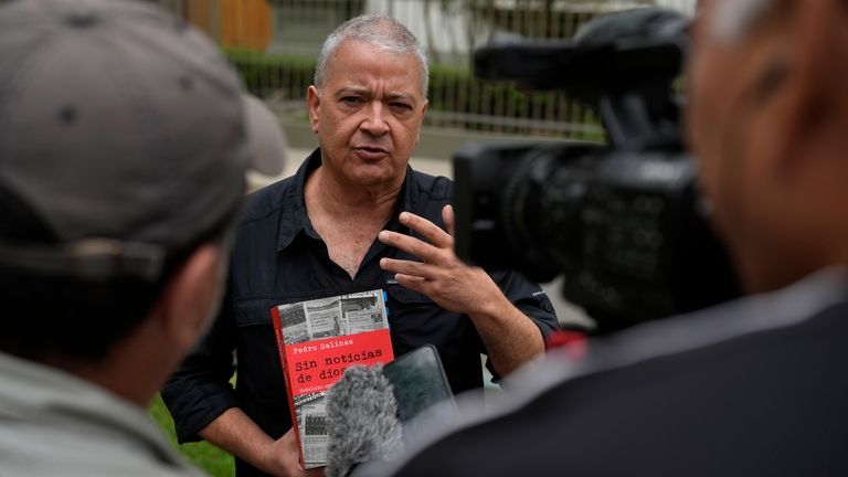 Pedro Salinas speaks with the press outside the Nunciatura Apostolica...