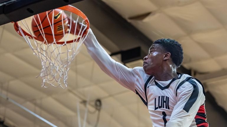 Long Island Lutheran’s VJ Edgecombe dunks the ball on a...