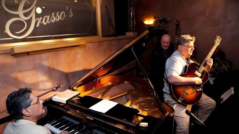 The Mark Marino trio performs jazz for patrons at Grasso's...