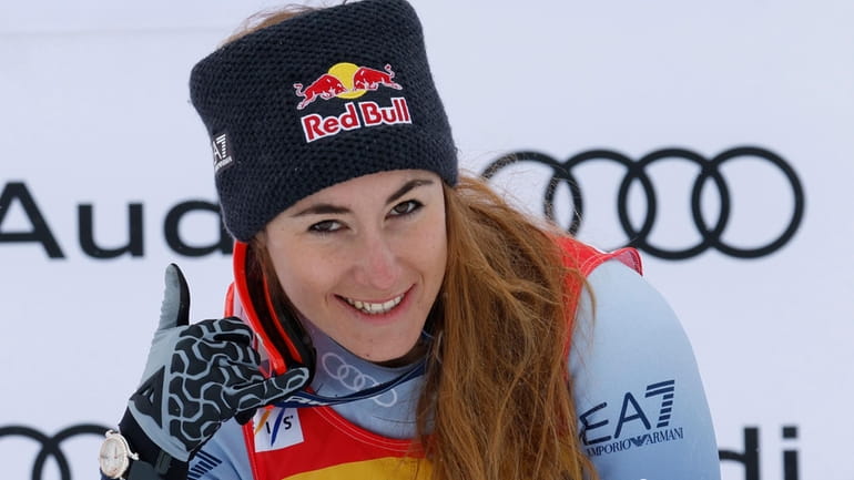 Italy's Sofia Goggia celebrates winning an alpine ski, women's World...