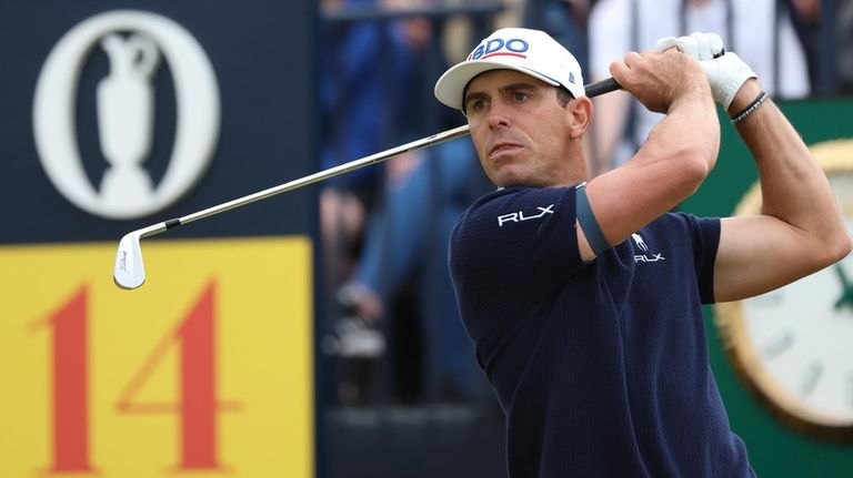 Billy Horschel of the United States hits off the 14th...