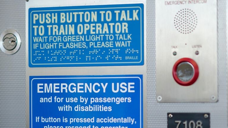 An emergency communication panel is seen on a Chicago Transit...