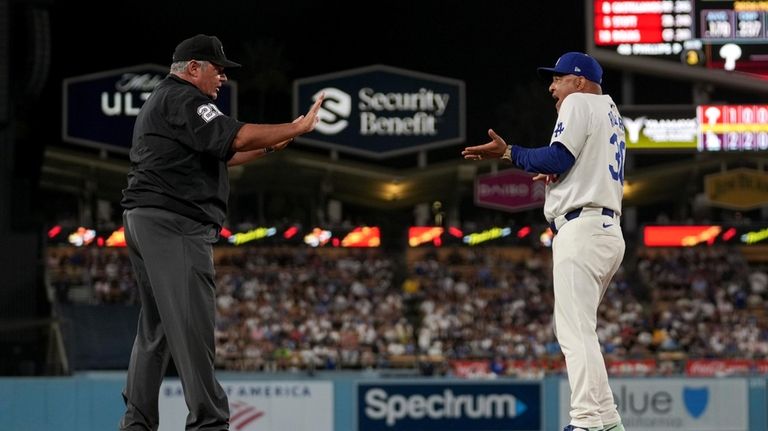 Los Angeles Dodgers manager Dave Roberts is ejected during the...