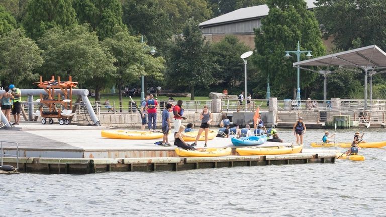 People go kayaking at Pier 96.