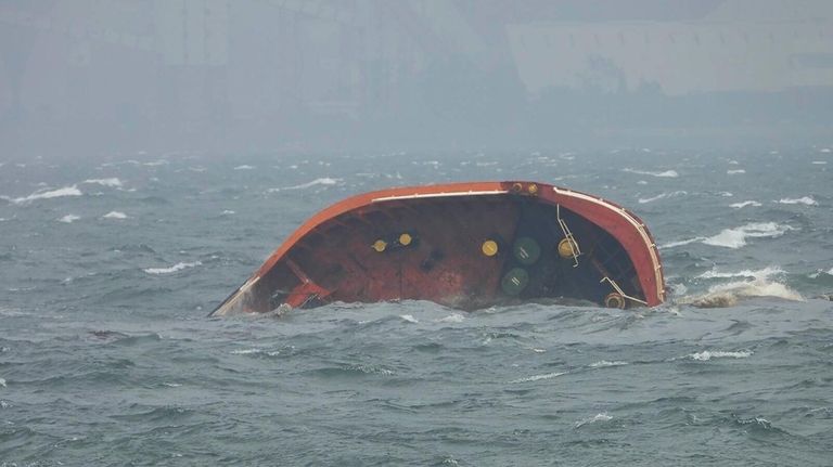 In this photo provided by the Philippine Coast Guard, Philippine-flagged...