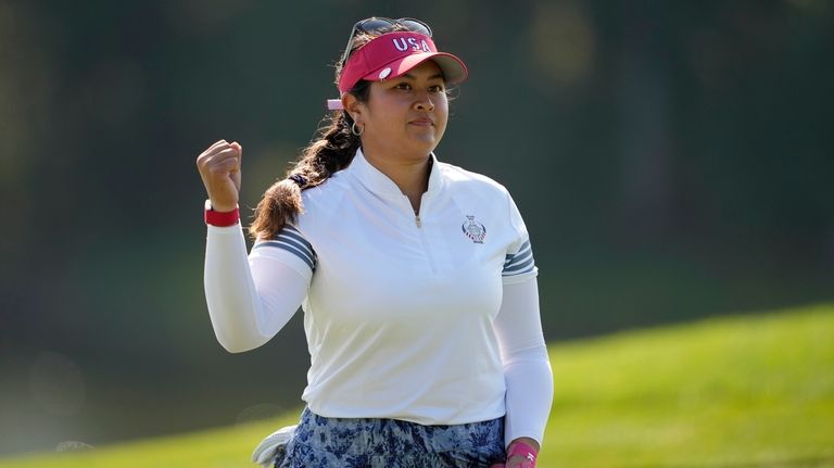 United States' Lilia Vu celebrates after making a putt on...