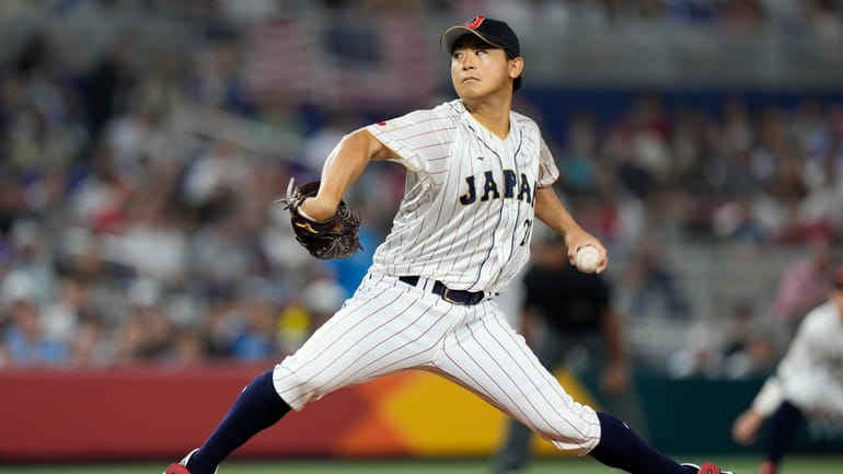 Japan pitcher Shota Imanaga throws during first inning of a...