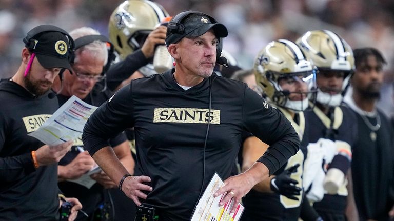 New Orleans Saints head coach Dennis Allen looks on during...