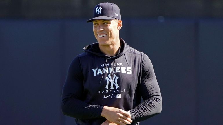 Yankees outfielder Aaron Judge, who homered twice Sunday, shares a laugh...