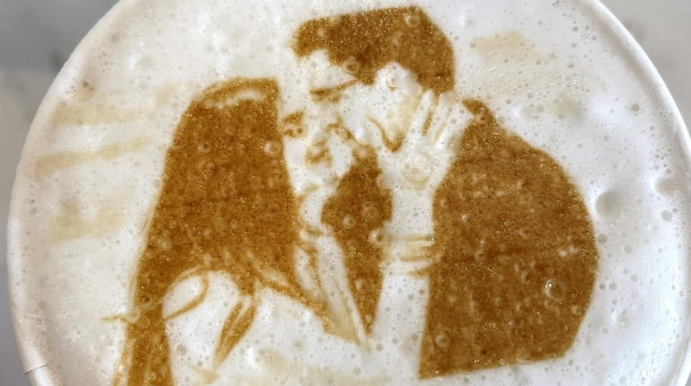A cappuccino imprinted with a custom edible picture at Sugar Bae...