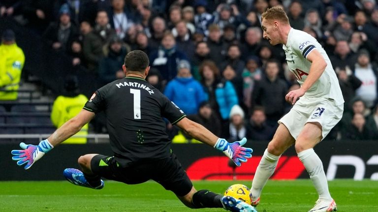 Tottenham's Dejan Kulusevski fails to score past Aston Villa's goalkeeper...