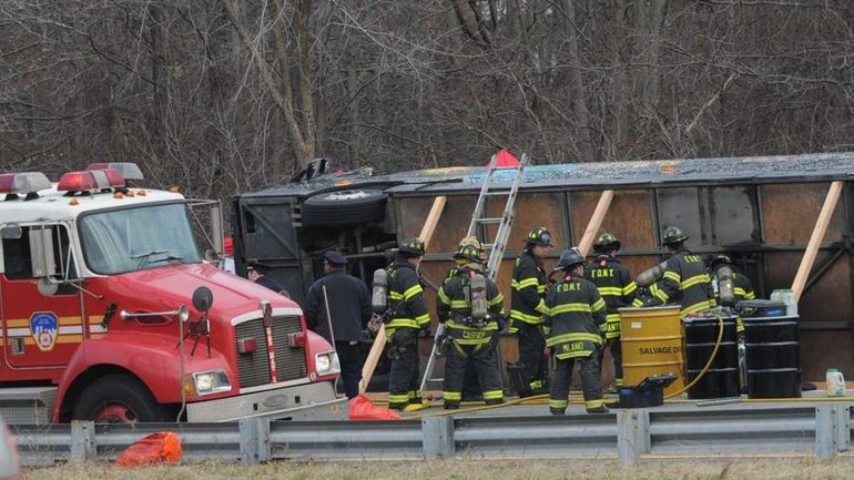 Emergency personnel work the scene of a deadly bus crash...