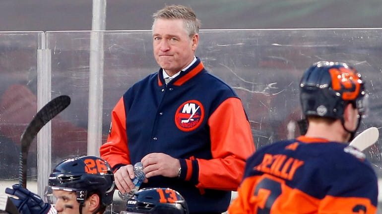 Islanders head coach Patrick Roy looks on against the Rangers during...