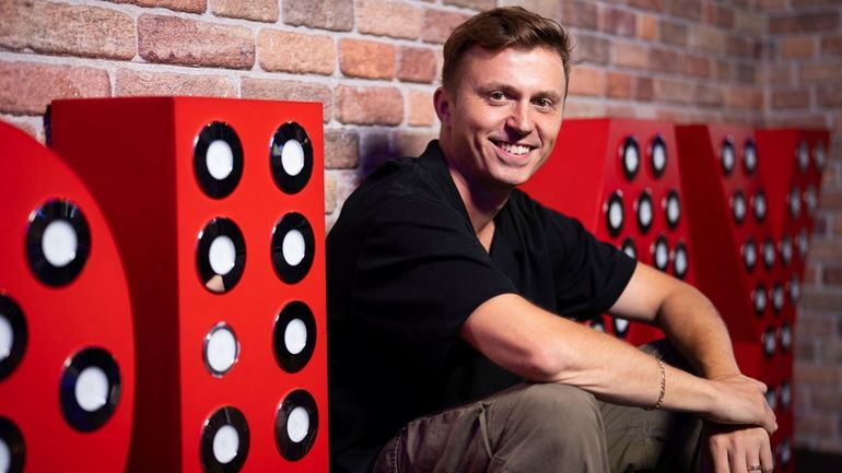 Choreographer Kenny Wormald poses for photographs after an interview with...