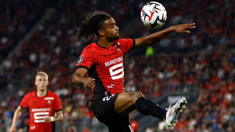 Rennes' Lorenz Assignon controls the ball during the French League...