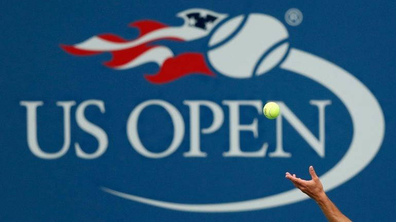 Philipp Kohlschreiber, of Germany, serves to John Millman, of Australia,...