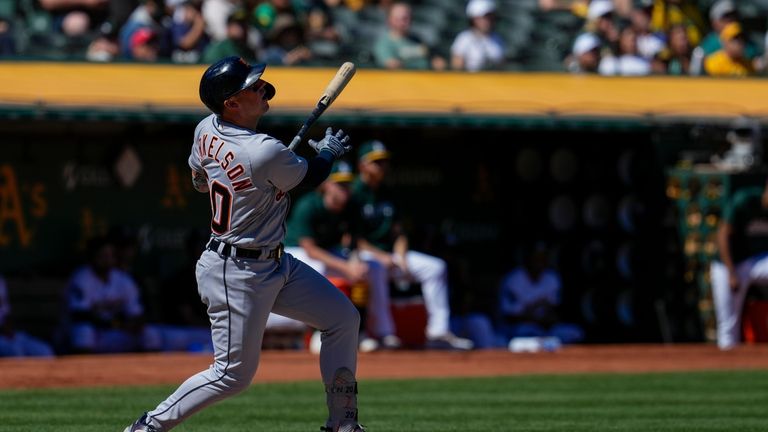 Detroit Tigers' Spencer Torkelson watches his RBI single against the...