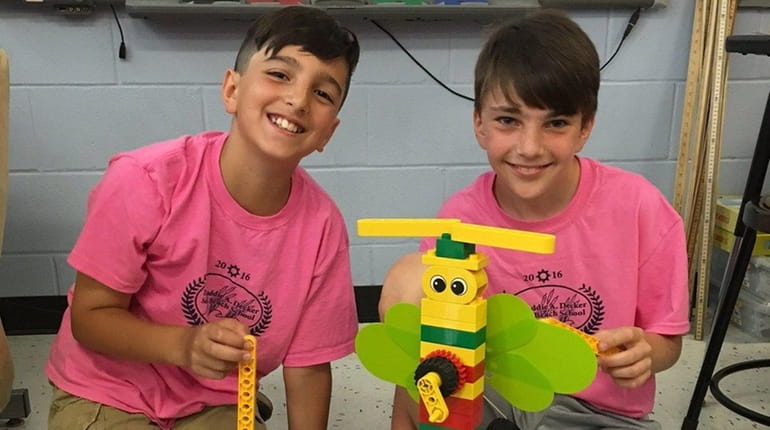 Christian Tarsia, left, and Peter Conelli show off their Lego...