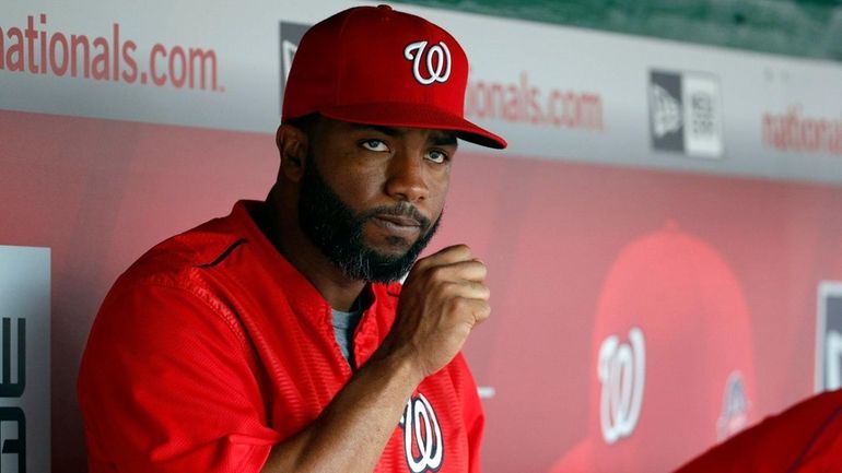 Washington Nationals center fielder Denard Span (2) sits in the...