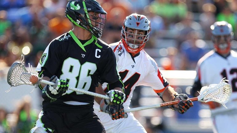 Kevin Unterstein #86 of the Lizards carries the ball against...