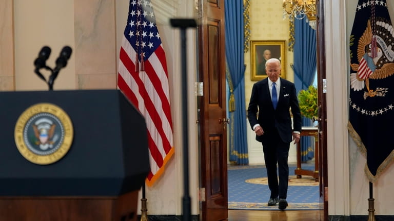 President Joe Biden arrives to speak in the Cross Hall...